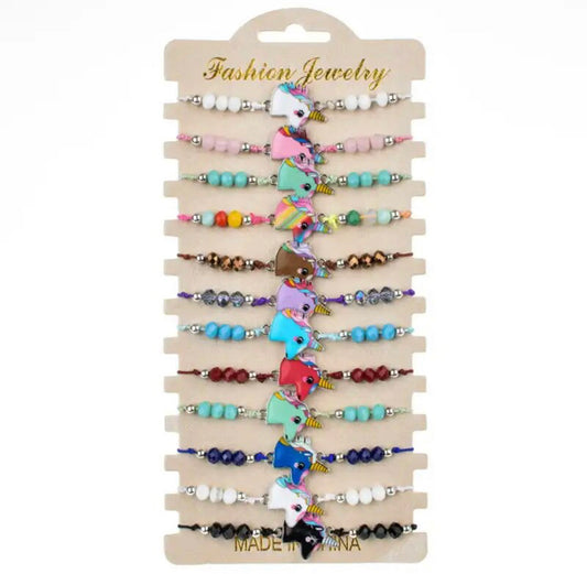 1 docena de pulseras de unicornio.